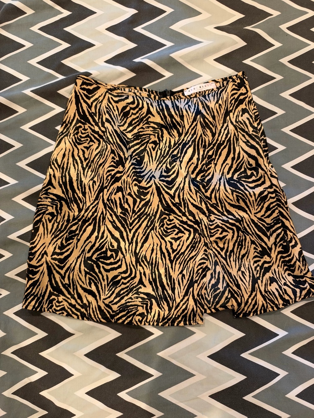 Blue Blush Animal Print Mini Skirt - Black & Tan